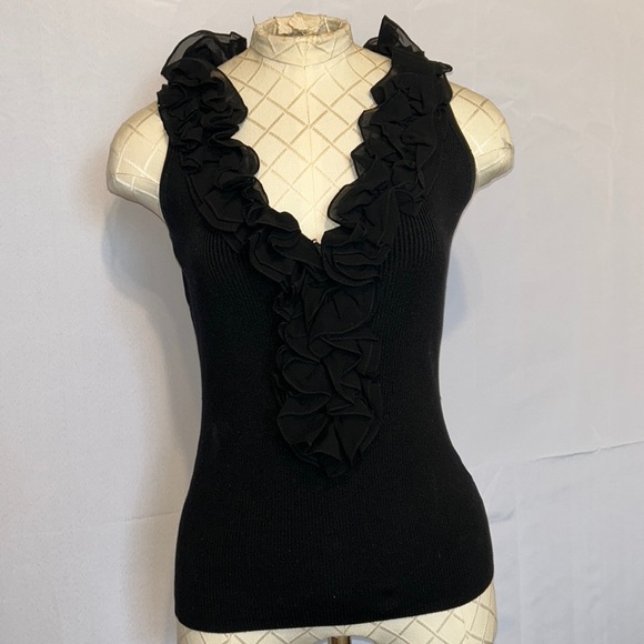 White House Black Market Sweaters - White House Black market size medium sleeveless sweater. Black with ruffles. EUC